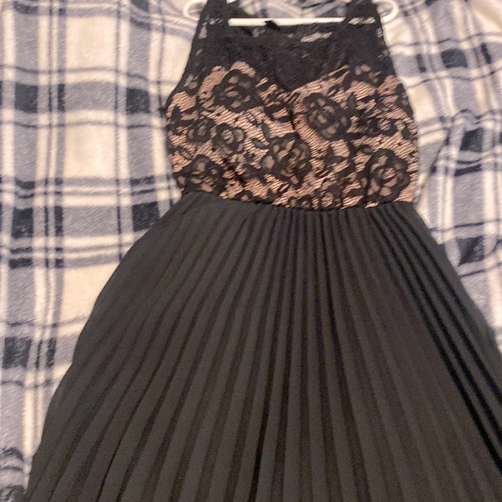 Beautiful long M sized black and nude gown.